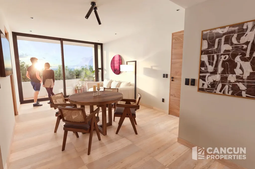 Dining room and terrace at Esther WOW Condos in Vía Cumbres, Cancun.