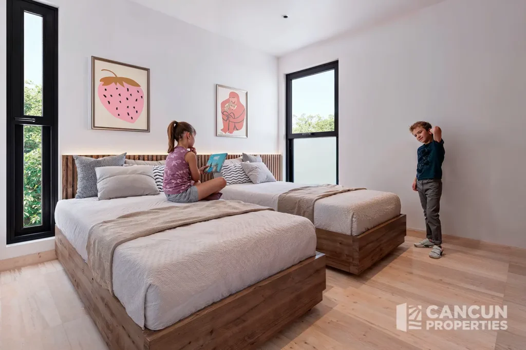 Secondary bedroom at Esther WOW Condos three-bedroom condo in Vía Cumbres, Cancun.